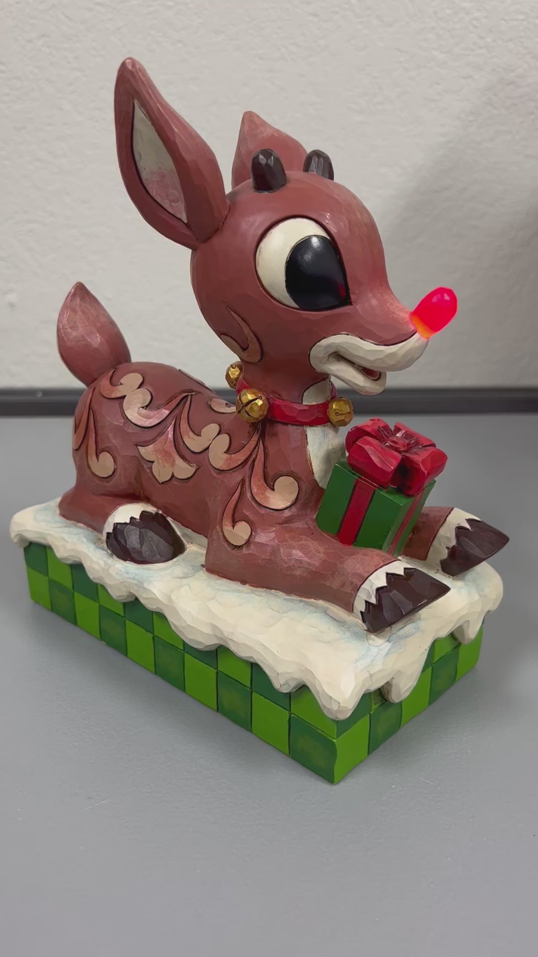 Jim Shore Rudolph Traditions - Rudolph the Red-Nosed Reindeer Present light up nose Figurine